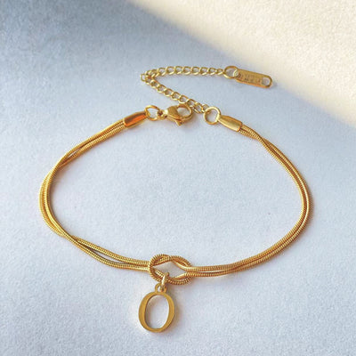 A-Z Love Knot Armband för Kvinnor & Par - Guldfärgad Stål Snake Chain Charm - Elegant Smycke till Alla Hjärtans Dag